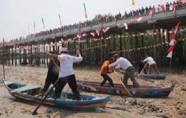 Pacu Sampan Leper dari Transportasi ke Tradisi Hingga  Menuju Destinasi Wisata Tahunan di Inhil